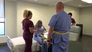 Physical Therapy Transfer Training  How To Transfer From Wheelchair To Bed [upl. by Cyprio]